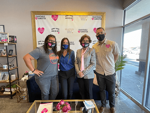 Senator Rosen poses with employees of the Just One Project